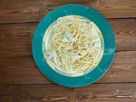 Spaghetti with chicken in a creamy sauceの写真素材