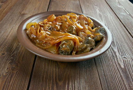 Bifes de cebolada - Portuguese onion stew, onion sauce or paste that is prepared with onion as a primary ingredient.の写真素材