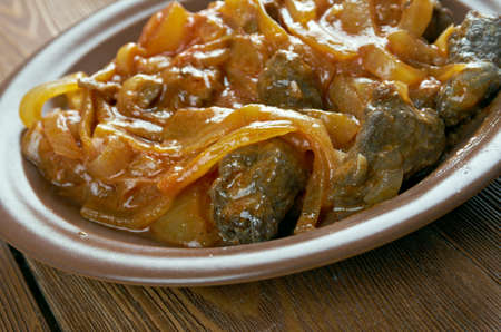 Bifes de cebolada - Portuguese onion stew, onion sauce or paste that is prepared with onion as a primary ingredient.の写真素材