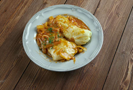 Golumpki  - cabbage roll common in Polish cuisine.made from  boiled cabbage leaves wrapped around minced pork or beef, chopped onions, and rice,  baked in a casserole dish.の写真素材