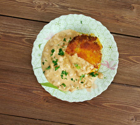 Ragda patties - popular Indian fast food or snack street food of Mumbai.dried yellow pea soup and patties, a fried potato cutlet.の写真素材