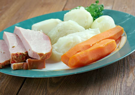 New England boiled dinner - basis  traditional New England meal, consisting of corned beef with cabbage and vegetable, potato.popular in New England and parts of Atlantic Canada.の写真素材