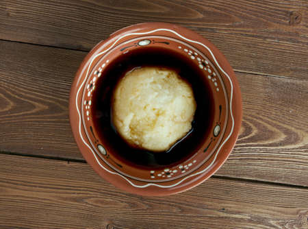 Asida - cooked wheat flour lump of dough.popular in Algeria, Libya, Tunisia, Saudi Arabia, Eritrea, Ethiopia, Sudan, and Yemen.の写真素材