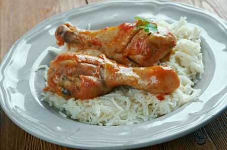 Youvetsi. Braised Chicken with pasta  Tomato Based Sauce. baked Greek meat dishの写真素材