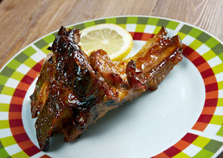 Spicy pork ribs in orange sauceの写真素材