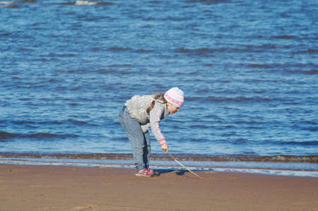 Children on the beach .White Sea .Russia, Arkhangelsk region.の写真素材
