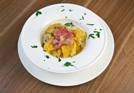 potato gnocchi with cheese and bacon. close upの写真素材