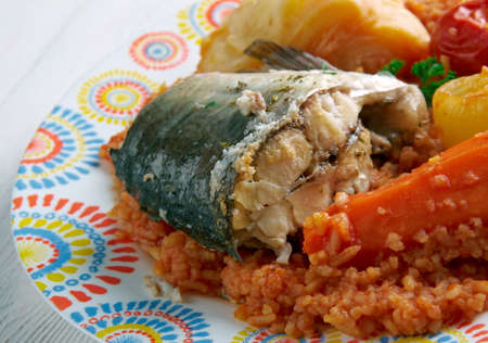 Thieboudienne - traditional dish from Senegal.made from fish, rice and tomato sauceの写真素材