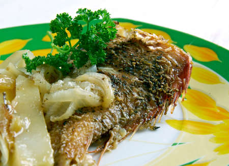 Pescado frito - fried fish  in Spanish.