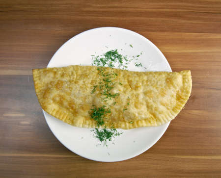 Cheburek with meat - traditional Caucasian dish.