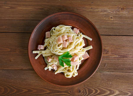 Fettuccine alla papalina - pasta with prosciutto,parmesan,butterの写真素材