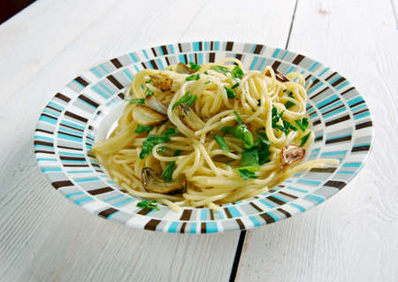 Spaghetti aglio e olio -  spaghetti with garlic and oil.traditional Italian pasta dish, coming from Napoliの写真素材