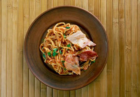 Spaghetti allamatriciana with bacon.traditional Italian pasta sauceの写真素材