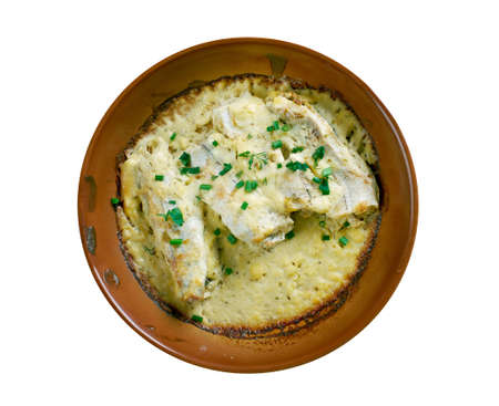 baked cod in sour cream . close up