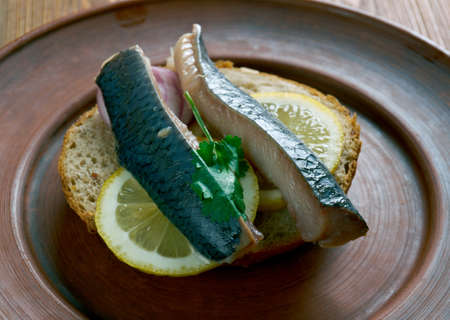 Soused herring-  herring soaked in a mild preserving liquid. It can be raw herring in a mild vinegar pickle or Dutch brined herringの写真素材