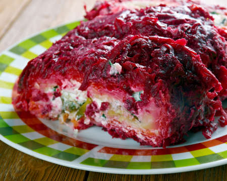 beet roulade with vegetables and feta cheese.の写真素材