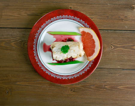 Bacalao confitado con salsa verde - cod fish gourmet.の写真素材