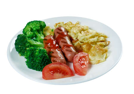 Country breakfast - scrambled eggs, sausages, vegetables, coffee and croissantの写真素材