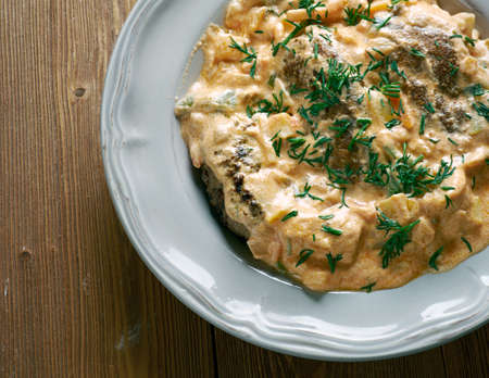 krucheniki - Ukrainian meat dish in cream sauce with mushrooms.の写真素材