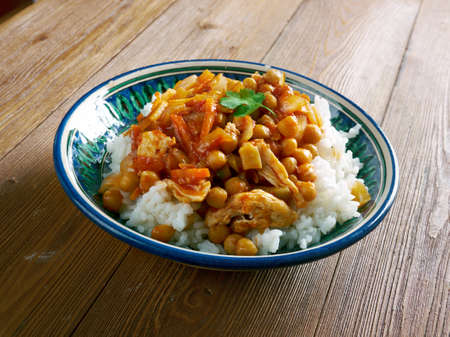 Oshi afgani - Afghan dish with chicken, chickpeas and carrotsの写真素材