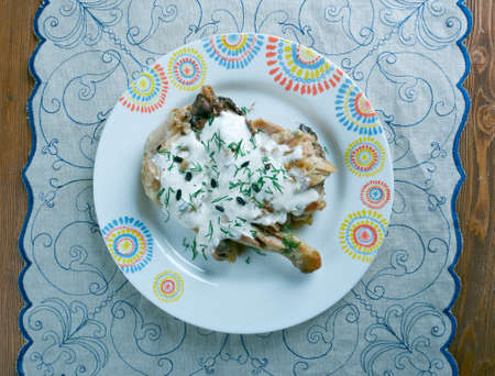 chkmeruli chicken -  traditional Georgian dish of chicken in garlic cream sauce.の写真素材