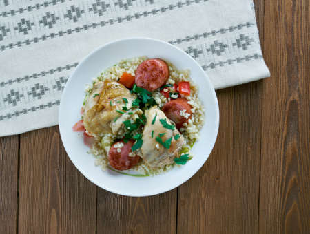 Chicken and chorizo rice pot. chicken casserole for sharing, flavoured with Spanish sausage.の写真素材