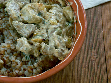Russian dinner - Buckwheat porridge with fried liver in sour creamの写真素材
