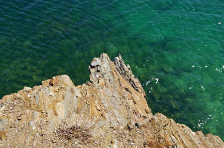 he rocky cliff . Maloe More Strait View, Cape Uyuga, Baikal lake