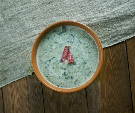 suppilovahverokeitto -  Finnish creamy soup with chanterelles. close upの写真素材