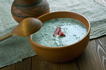 suppilovahverokeitto -  Finnish creamy soup with chanterelles. close upの写真素材