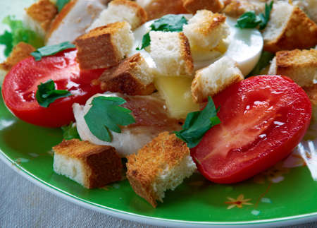 ensalada cezar con pollo- Mexico salad of romaine lettuce and croutons dressed with parmesan cheese, chicken, olive oil, egg,の写真素材