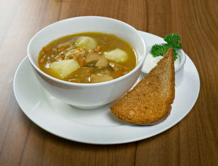 Mushroom soup with pearl barleyの写真素材