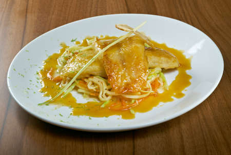 Pike-perch fillet  with vegetables and pasta.