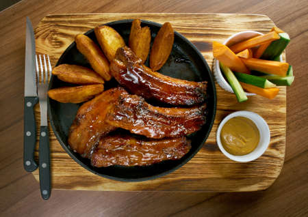 Grilled caramelized pork ribs in caramel sauceの写真素材