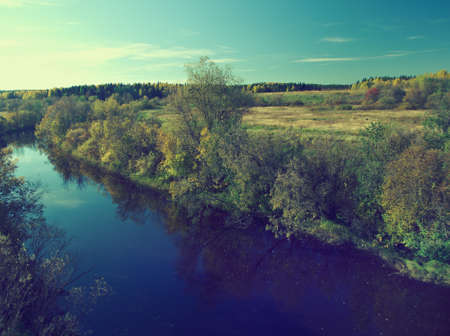 Fall River, reflected in the water autumn trees. Arkhangelsk region, Russiaの写真素材