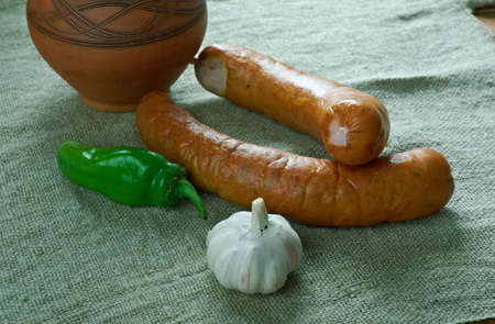 Krakowska Polish sausage kielbasa. made from cuts of lean pork, seasoned with pepper, allspice, coriander, and garlic,の写真素材