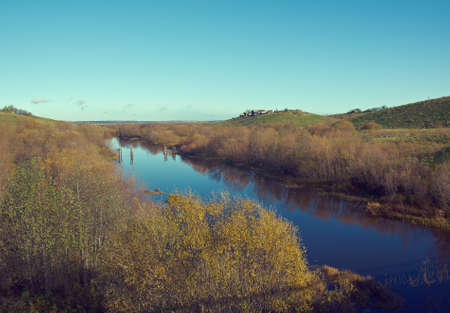Fall River, reflected in the water autumn trees.  Arkhangelsk region, Russiaの写真素材