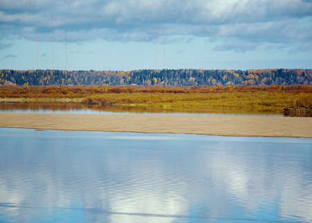 Fall River, reflected in the water autumn trees.  Arkhangelsk region, Russiaの写真素材