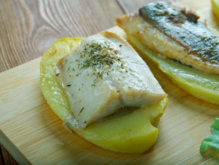 Patata con anguila al horno - Eel with baked potatoes.Spanish cuisine