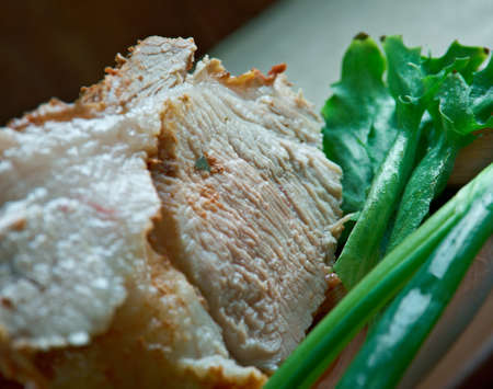 Kumpis - Lithuanian pork cooked ham.the old wooden background, selective focusの写真素材