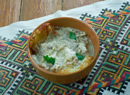 Roast Hutsul. Carpathian dish with meat, mushrooms and cream sauce