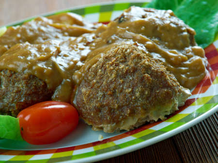Welsh Faggots ,Welsh-Style Pork Meatballs in a buttery caramelized onion gravy.の写真素材