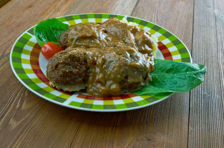 Welsh Faggots ,Welsh-Style Pork Meatballs in a buttery caramelized onion gravy.