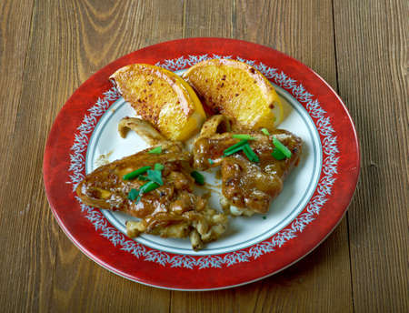 Sticky jerk wings with sugared oranges.Caribbean Food