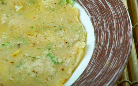 Akki rotti -  Spicy Indian  traditional breakfast dish,made from rice flour, carrot and coconut.