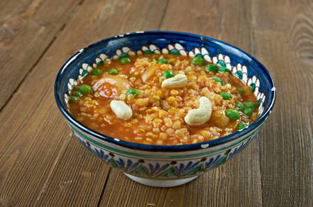 Bisi Bele Bath - rice-based dish with origins in the state of Karnataka, India. hot lentil rice