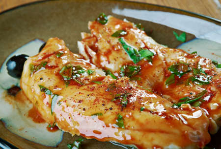 Pan-Seared Cod in White Wine Tomato Basil Sauceの写真素材