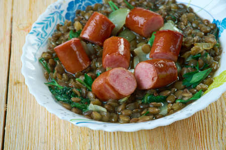 Lentilles vertes garnies - Sausage with green lentils. French cuisineの写真素材