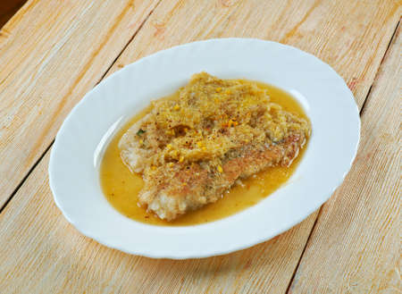 Grilled Monkfish in Orange Sauce.の写真素材