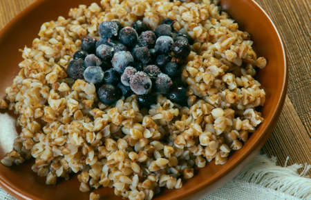 Tattaripuuro - Finnish version of buckwheat porridge with blueberriesの写真素材